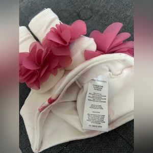 Newborn Bernie with flower socks.